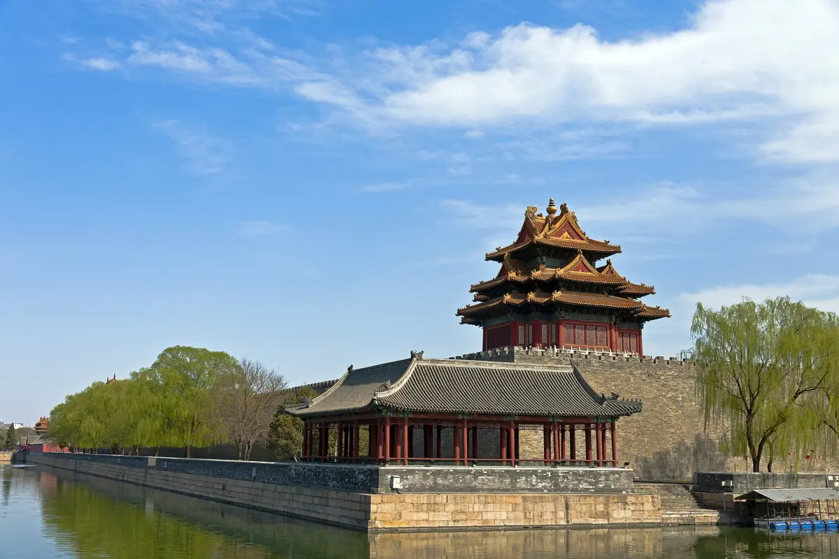 Corner tower and moat of the Forbidden City in spring