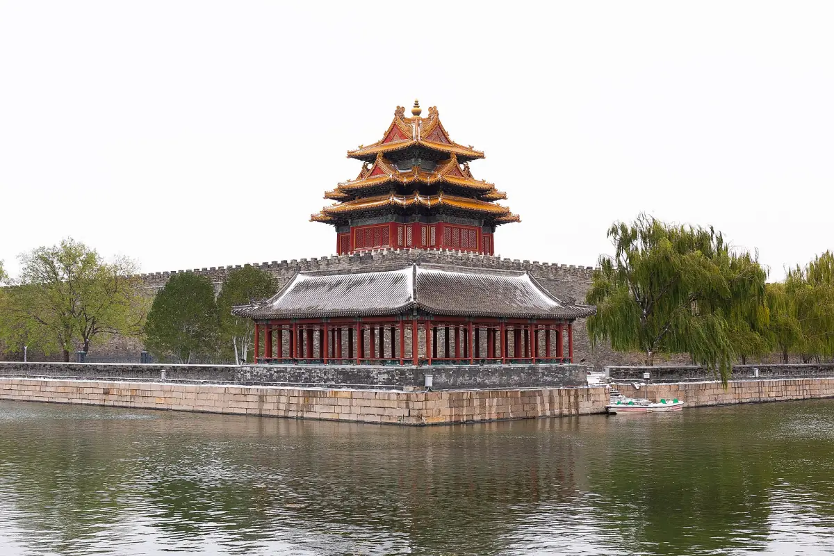 The northwest corner tower reflected in the palace moat